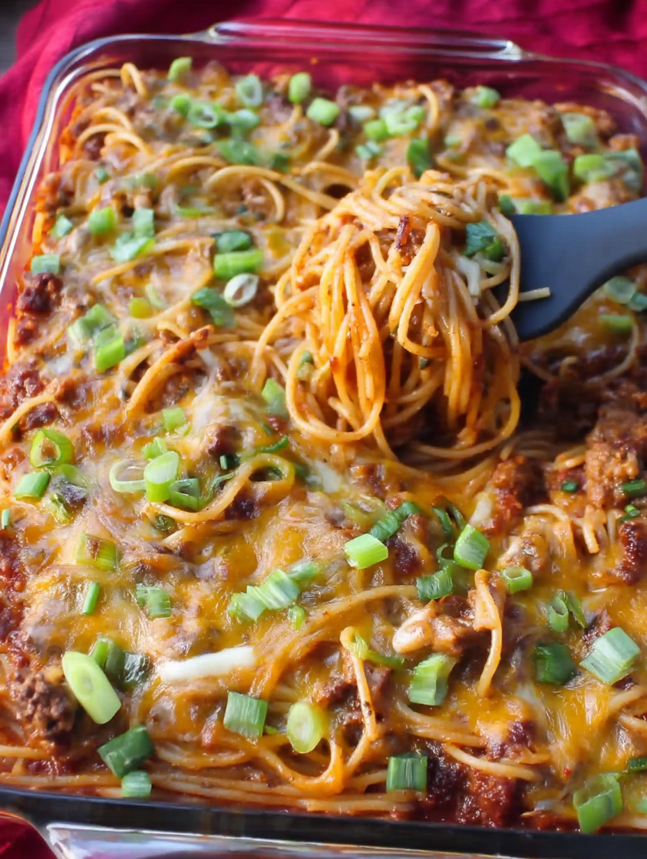 A fork is being used to pick up a piece of food.